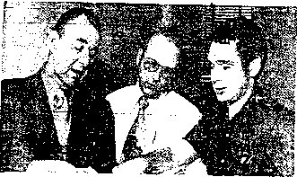 THE EXPERTS - Three UFO specialists go over data compiled after a 36-hour vigil at a mine water pond in Carbondale apparently ended with discovery of a railroad lantern. From left: Robert D. Barry, director of the 20th Century UFO Bureau, Collingswood, N.J.: Douglas Dain, regional director of the UFO Network Association in New York City, an arm of the Center for UFO Studies at Northwestern University, Evanston, Ill., and Matthew J. Graeber, director of UFO Research Information Center, Philadelphia. 